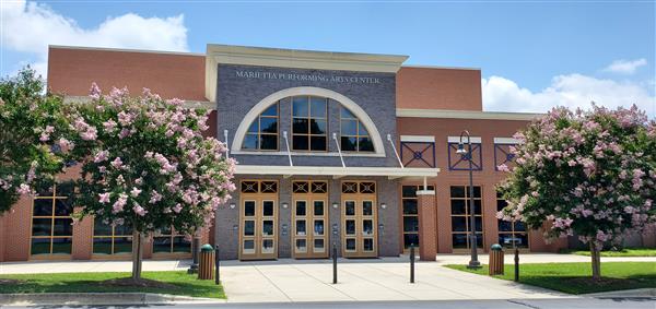 Exterior of the Performing Arts Center during the daytime